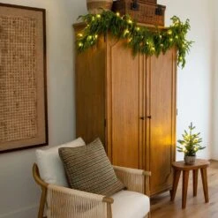 6 Ft. Pre-Lit Artificial Real Touch Norfolk Island Pine Garland With 35-Warm White LED Lights And Natural Look -Christmas Gift Shop nearly natural christmas garland w1393 fa 1000