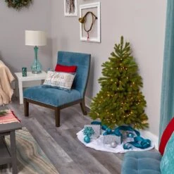 4 Ft. Pre-Lit Cambridge Spruce Flat Back Artificial Christmas Tree With 100 Warm White Multi-Function LED Lights 20 4 Ft. Pre-Lit Cambridge Spruce Flat Back Artificial Christmas Tree With 100 Warm White Multi-Function LED Lights -Christmas Gift Shop nearly natural pre lit christmas trees t1565 76 1000