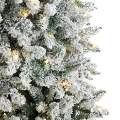 9 Ft. Pre-Lit LED Slim Flocked Montreal Fir Artificial Christmas Tree With 600 Warm White Lights 19 9 Ft. Pre-Lit LED Slim Flocked Montreal Fir Artificial Christmas Tree With 600 Warm White Lights -Christmas Gift Shop nearly natural pre lit christmas trees t3313 1f 1000