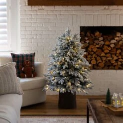 4 Ft. Pre-Lit Artificial Flocked Christmas Tree With 100-Warm White LED Lights In Decorative Trunk Planter -Christmas Gift Shop nearly natural pre lit christmas trees t5405 31 1000