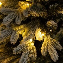 4 Ft. Pre-Lit Artificial Flocked Christmas Tree With 100-Warm White LED Lights In Decorative Trunk Planter -Christmas Gift Shop nearly natural pre lit christmas trees t5405 66 1000