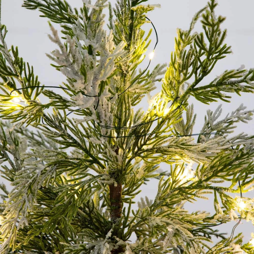 18 In. Pre-Lit Artificial Mini Snowed Cypress Christmas Tree With 12-LED Lights In White Ceramic Planter 8 18 In. Pre-Lit Artificial Mini Snowed Cypress Christmas Tree With 12-LED Lights In White Ceramic Planter - Image 6